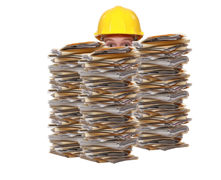 Mining Contractor with stacks of paperwork